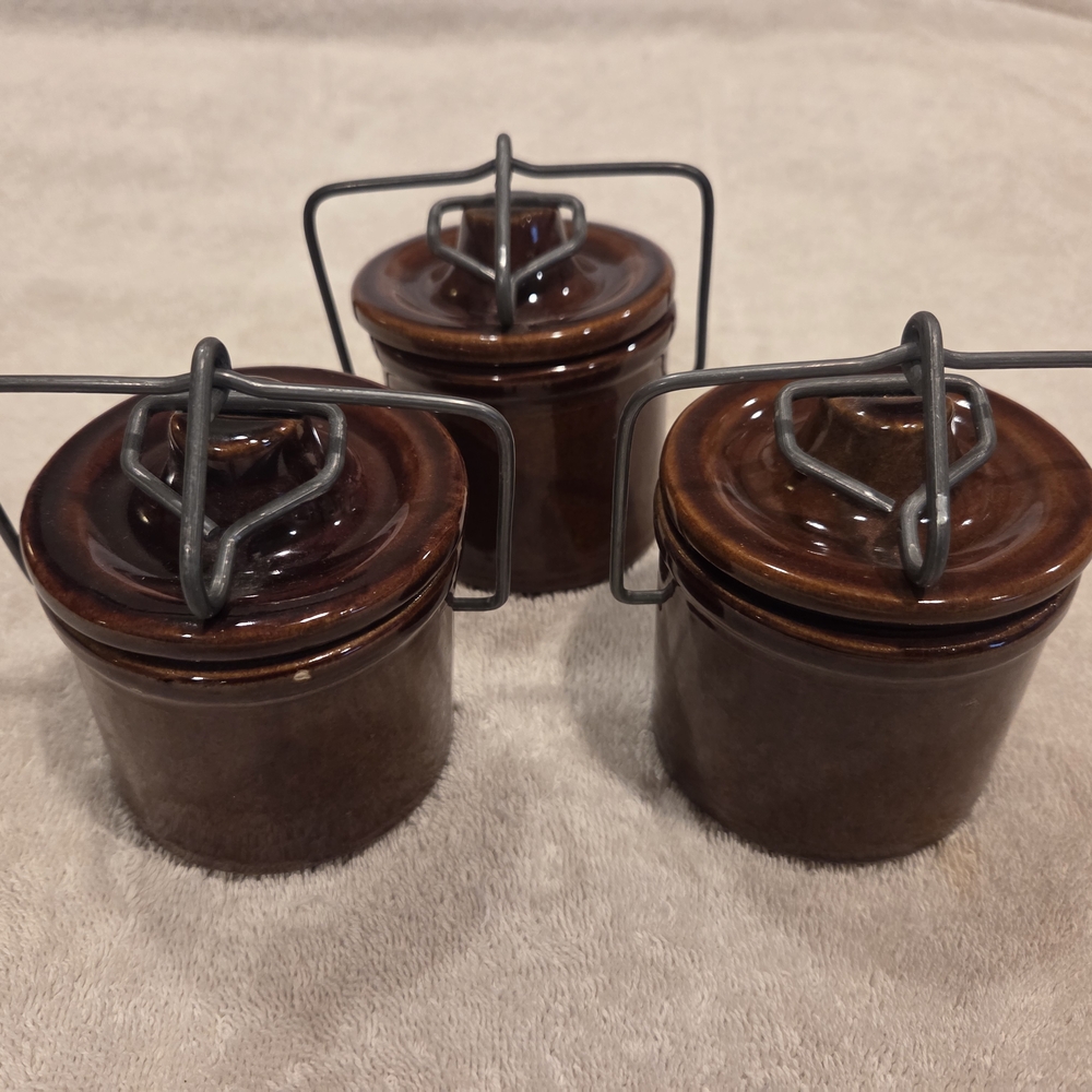 Set of Three Brown Ceramic Jars with Metal Handles